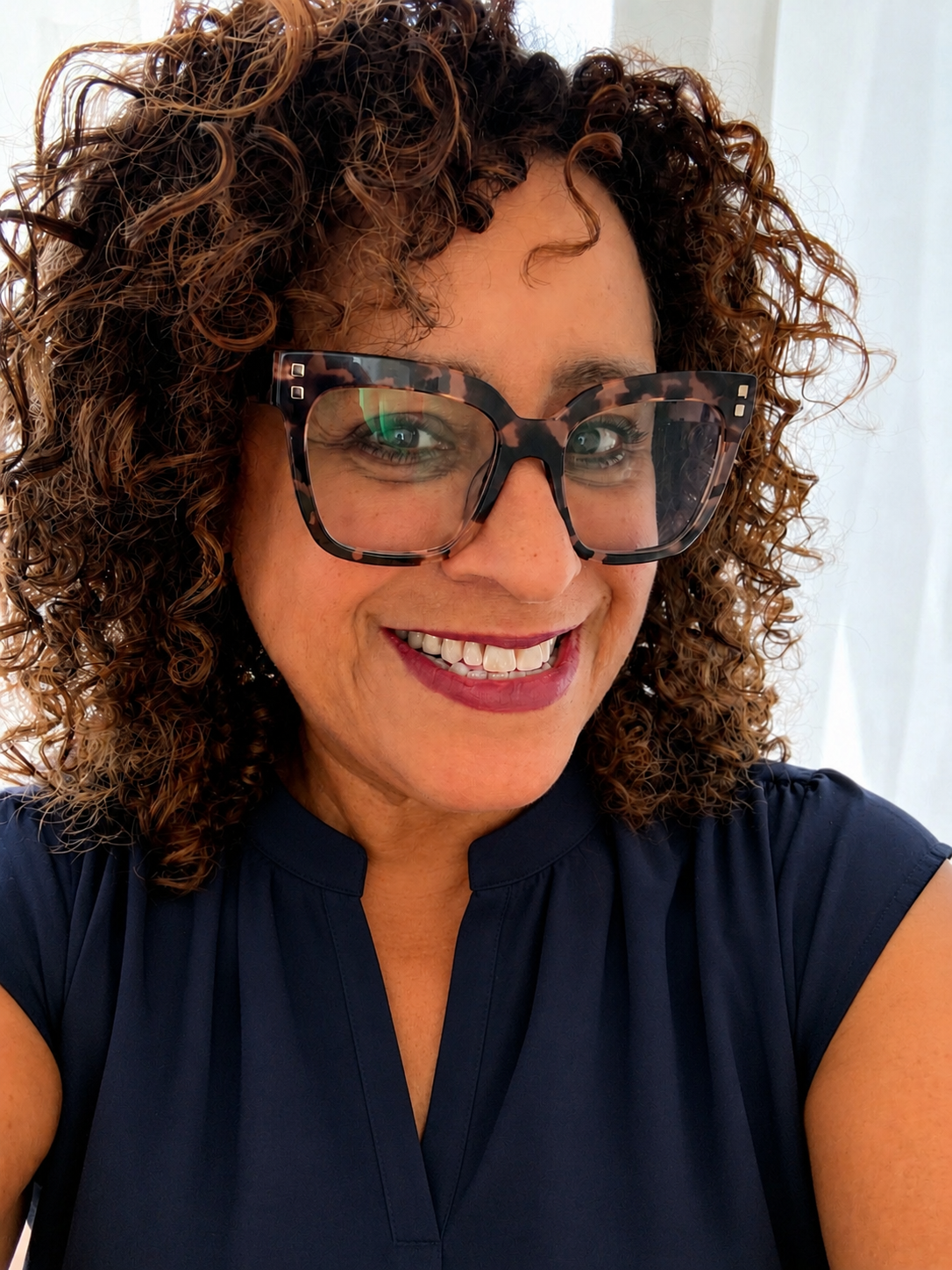 Roz Humphreys smiling in warm natural light